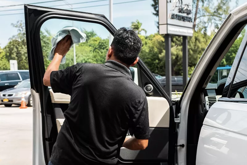 Clean car windows after detailing service at Prestige Auto Spa Miami.