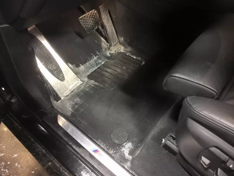 Close-up of a car seat before and after deep cleaning