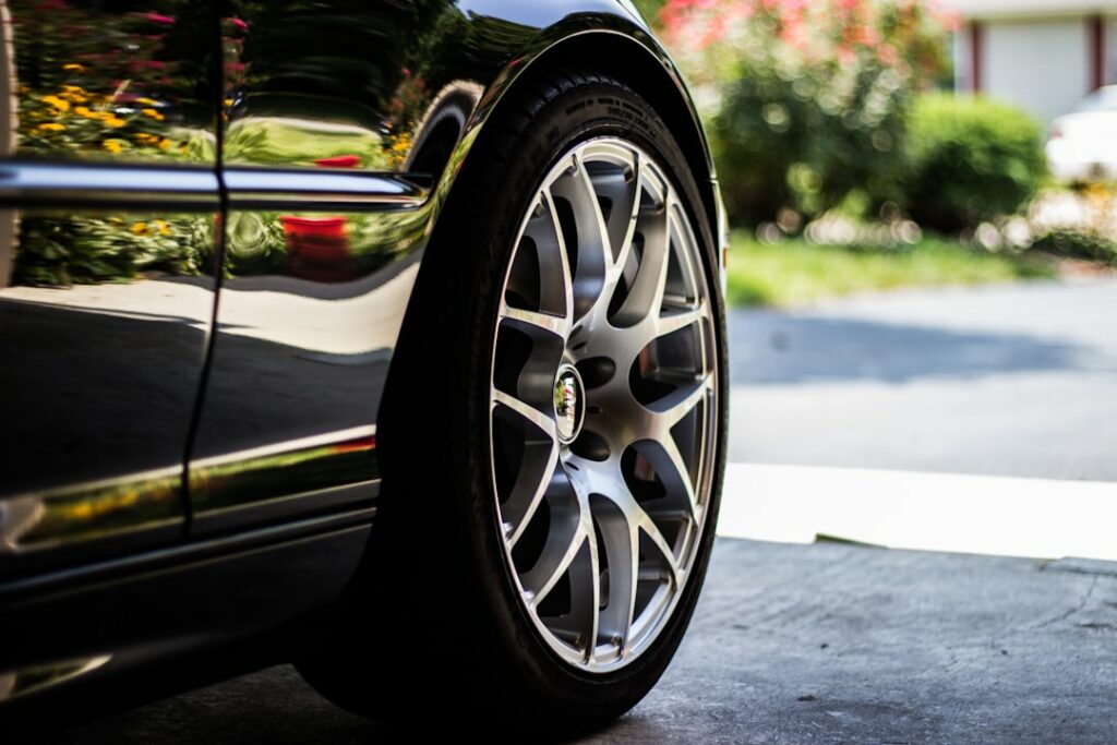 Car tire and aluminum wheel rim close up