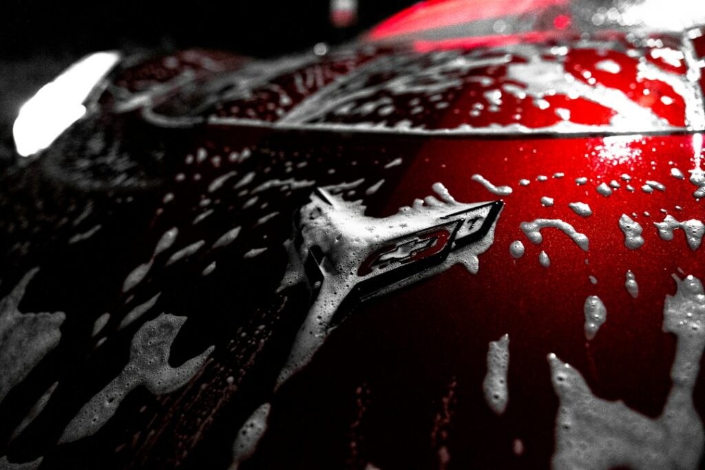 Car being waxed and polished for ceramic coating