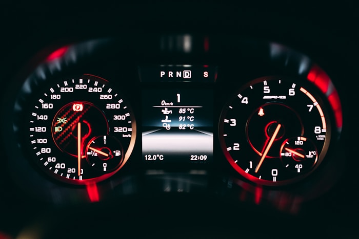 Car dashboard with engine warning lights and diagnostics