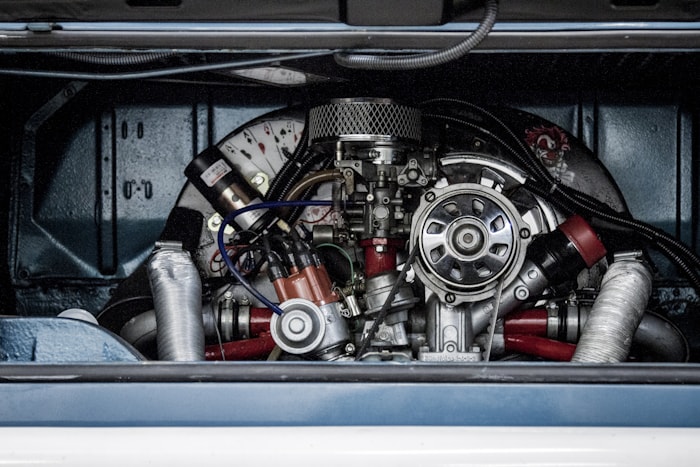 Car engine bay showing fuel system components