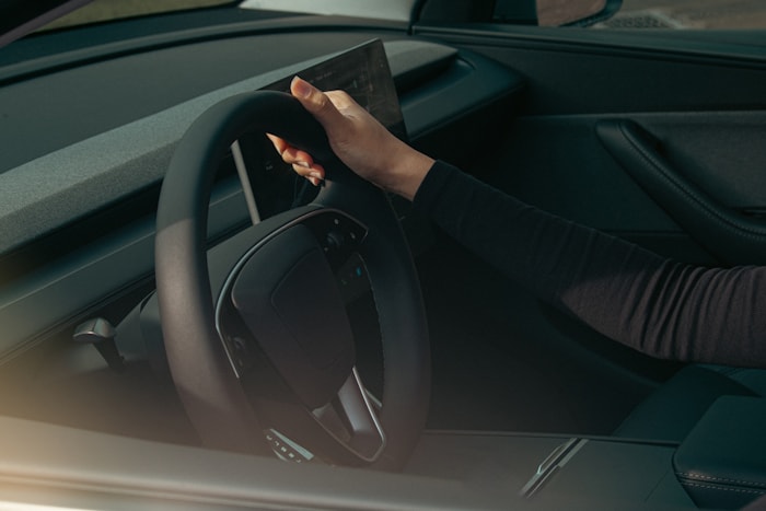 Modern car interior dashboard with steering wheel