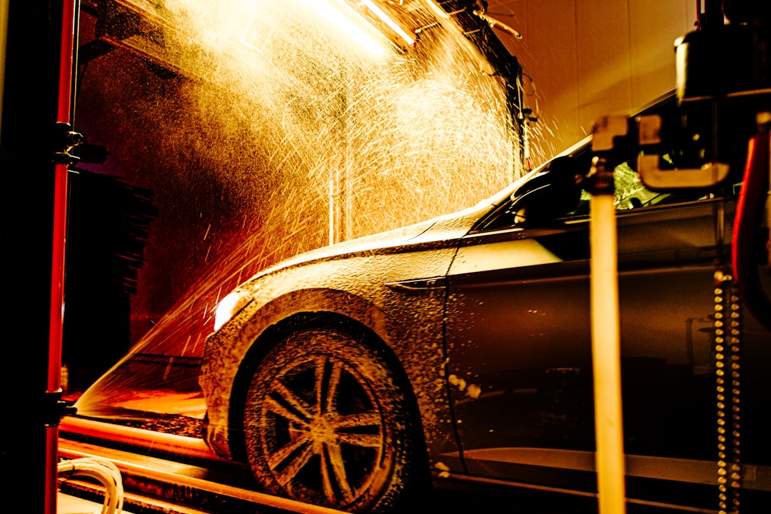 Car being washed with foam soap exterior cleaning